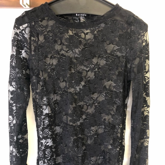 white blouse black tie neck